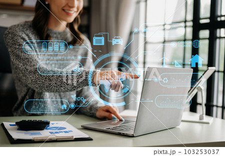 Business working with reduce CO2 concept with icons, global warming such as reforest green factory recycle and zero carbon dioxide emission concept. with VR icon at office. Business working with reduce CO2 concept with icons, global warming such as reforest green factory recycle and zero carbon dioxide emission concept. with VR icon at office. 103253037