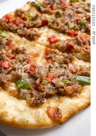 Kiymali pide Turkish pide with minced meat, on gray concrete table background, close up macro 103253862
