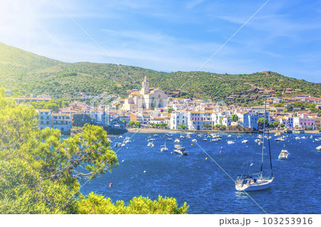 Sailing boats and Cadaques village beach, Catalonia, Costa Brava, Spain Sailing boats and Cadaques village beach, Catalonia, Costa Brava, Spain 103253916