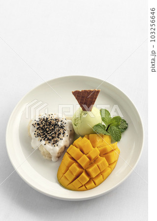 Mango with Sticky Rice and Pandan ice cream thai dessert Mango with Sticky Rice and Pandan ice cream thai dessert 103256646