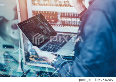 Electricity engineer work using AI computer software control monitor power consumption saving energy concept Electricity engineer work using AI computer software control monitor power consumption saving energy concept 103258285
