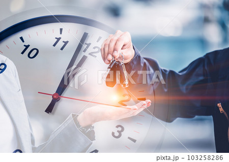people giving car to hand overlay with time clock for times to repair service a car replace schedule people giving car to hand overlay with time clock for times to repair service a car replace schedule 103258286