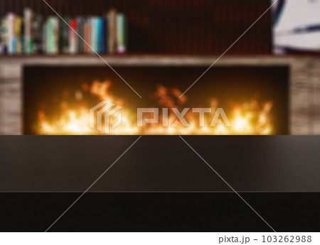 Black table surface with defocused background fireplace Black table surface with defocused background fireplace 103262988