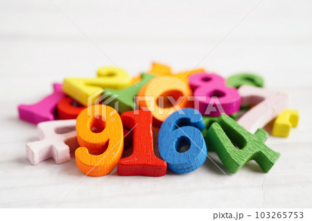 Number wood block cubes for learning Mathematic, education math concept. 103265753