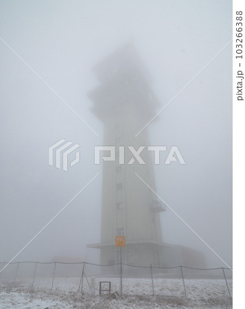 Tadiocommunication tower in fog. Klinovec Mountain Tadiocommunication tower in fog. Klinovec Mountain 103266388