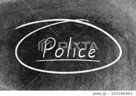 White chalk hand writing in word police and circle shape on blackboard background White chalk hand writing in word police and circle shape on blackboard background 103266963