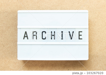 Lightbox with word archive on wood background 103267020