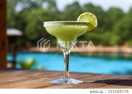 A shot of a frozen margarita in a salt-rimmed glass, against a beach or poolside setting, conjuring up images of vacations and relaxation. Generative AI A shot of a frozen margarita in a salt-rimmed glass, against a beach or poolside setting, conjuring up images of vacations and relaxation. Generative AI 103269176