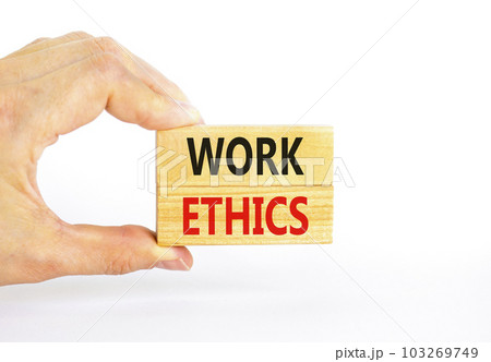 Work ethics symbol. Concept words Work ethics on beautiful wooden block. Beautiful white table white background. Businessman hand. Business and Work ethics concept. Copy space. Work ethics symbol. Concept words Work ethics on beautiful wooden block. Beautiful white table white background. Businessman hand. Business and Work ethics concept. Copy space. 103269749