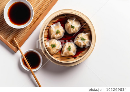 Hot dumplings dim sum in a bamboo steamer with soy sauce. Generative AI illustration 103269834