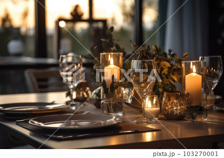 Romantic table setting with candles and flowers 103270001