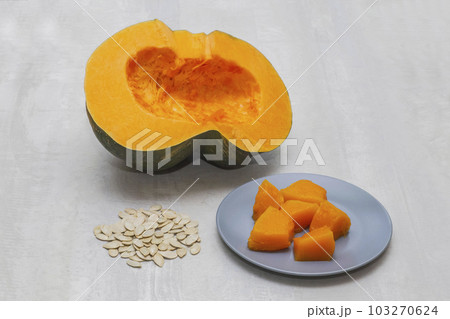 Pumpkin and a few baked pieces, pumpkin seeds 103270624