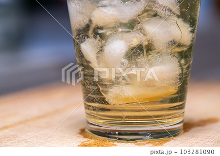 Ice liquid in the glass. Ice cube 103281090