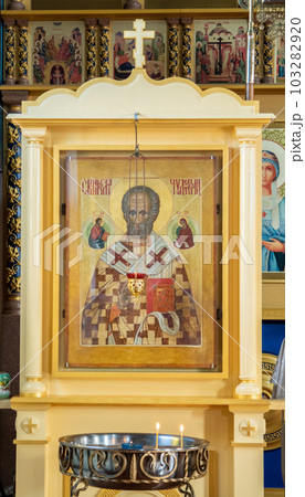 SHYMKENT, KAZAKHSTAN - JANUARY 24, 2023: ancient icon of Nicholas the Wonderworker in the Church of Our Lady of Kazan 103282920