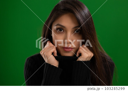 Young Asian woman with a beautiful face - portrait shot against color background 103285299