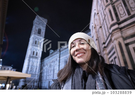 Woman taking a selfie at the Florence Cathedral, Florence, Italy 103288839