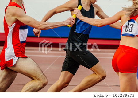 mixed track and field team running relay race in summer athletics championships mixed track and field team running relay race in summer athletics championships 103289573