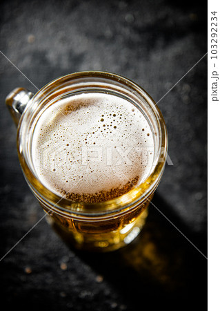 Glass with beer . Glass with beer . 103292234