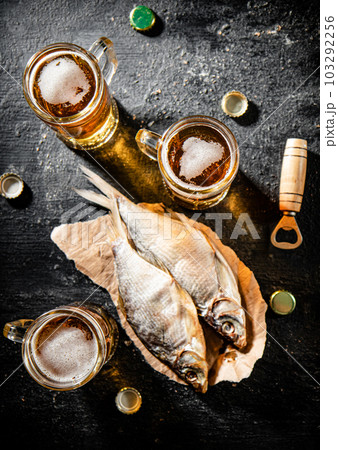 Beer with dried fish. 103292256