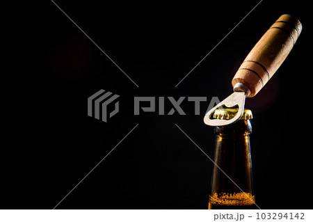 Beer bottle and opener. Beer bottle and opener. 103294142
