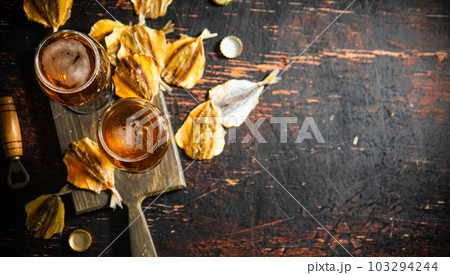 Beer and dried fish. Beer and dried fish. 103294244
