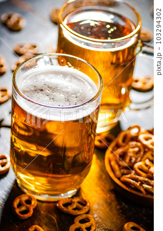 Beer with salty pretzels. Beer with salty pretzels. 103294302