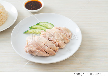 Hainanese chicken rice or rice steamed with chicken soup Hainanese chicken rice or rice steamed with chicken soup 103304300
