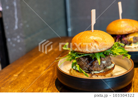 beef burger with cheese on plate beef burger with cheese on plate 103304322