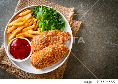 fried chicken breast fillet steak with french fries fried chicken breast fillet steak with french fries 103304535