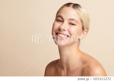 Beautiful smile of young woman with healthy white teeth on beige background, Dental care. Dentistry concept. Beautiful smile of young woman with healthy white teeth on beige background, Dental care. Dentistry concept. 103311272