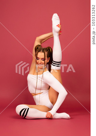 Full size young sporty athletic fitness trainer woman wear white tracksuit spend time in home gym train isolated on background. Workout sport concept Full size young sporty athletic fitness trainer woman wear white tracksuit spend time in home gym train isolated on background. Workout sport concept 103313262