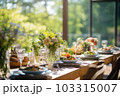 Romantic table setting with candles and flowers Romantic table setting with candles and flowers 103315007