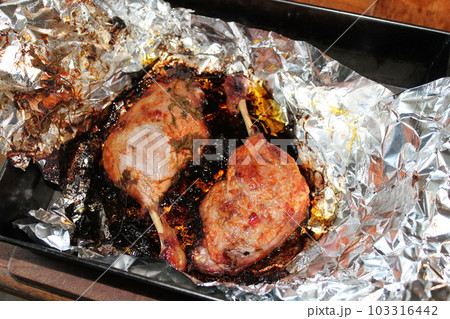 Baked duck legs in the oven Baked duck legs in the oven 103316442