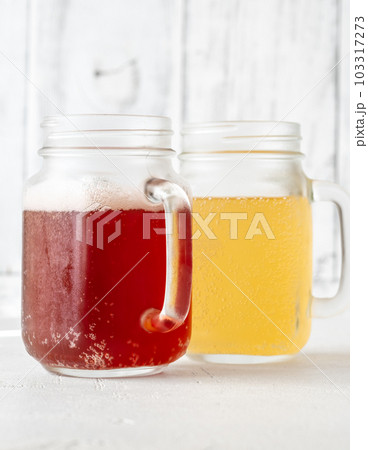 Two kombucha jars 103317273