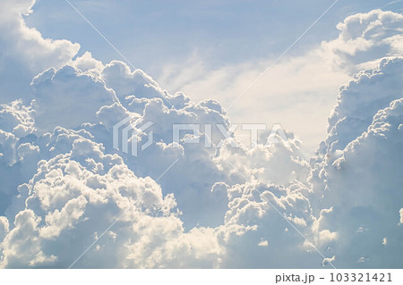 Beautiful white fluffys clouds sky background with blue sky background for copyspace Beautiful white fluffys clouds sky background with blue sky background for copyspace 103321421