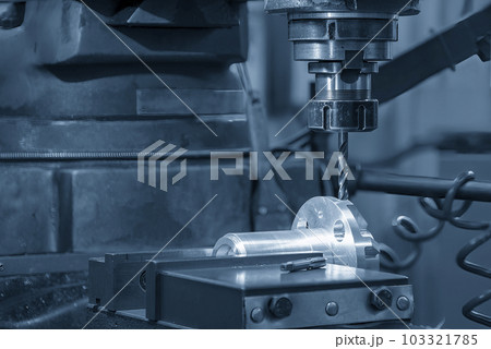 The drilling process on NC milling machine with automotive parts. The drilling process on NC milling machine with automotive parts. 103321785
