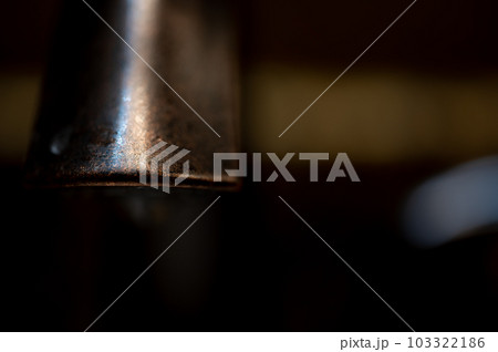 selective focus on the front lip of a bathroom faucet 103322186