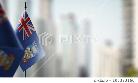 A small Falkland Islands flag on an abstract blurry background 103323166