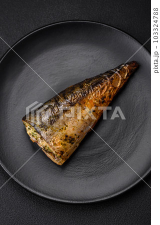 Delicious grilled ocean mackerel with salt, spices and herbs Delicious grilled ocean mackerel with salt, spices and herbs 103324788