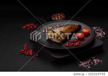 Delicious grilled ocean mackerel with salt, spices and herbs Delicious grilled ocean mackerel with salt, spices and herbs 103324793