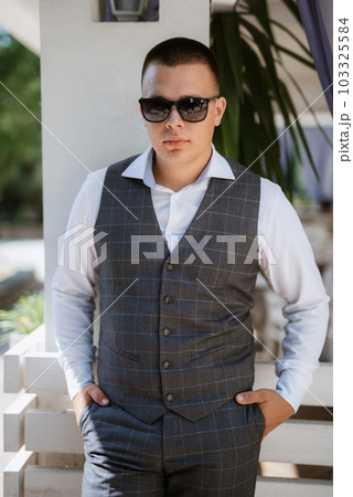 portrait of the groom of a man in the morning before the wedding portrait of the groom of a man in the morning before the wedding 103325584