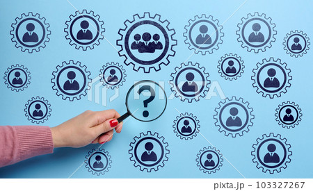 Human resource management concept, team performance improvement and leadership, female hand with a magnifying glass Human resource management concept, team performance improvement and leadership, female hand with a magnifying glass 103327267