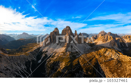 The edges of the high peaks of Tre Chime di Lavaredo at sunset. 103327461
