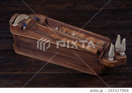 The Hurdy-gurdy, stringed musical instrument. 103327908