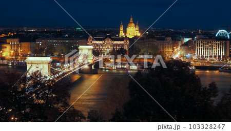 Chain Bridge and Parliament in night light of Budapest Chain Bridge and Parliament in night light of Budapest 103328247