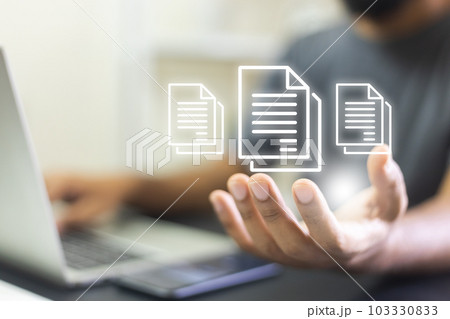 Electronic document concept. Businessman use laptop with virtual document on hand 103330833