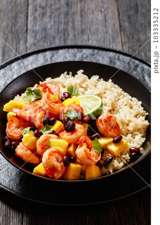 shrimps with beans, mango, brown rice in bowl 103335212