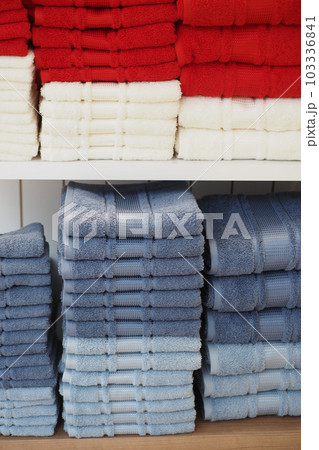 Close up of stack of shower towel on table. Close up of stack of shower towel on table. 103336841
