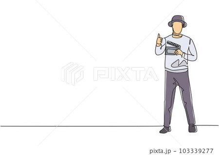 Single continuous line drawing film director stands with a thumbs-up gesture while holding the clapperboard to prepare the camera crew for shooting. One line draw graphic design vector illustration. 103339277