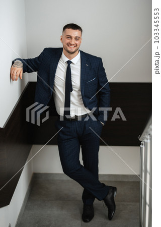 portrait of a bearded groom 103345553